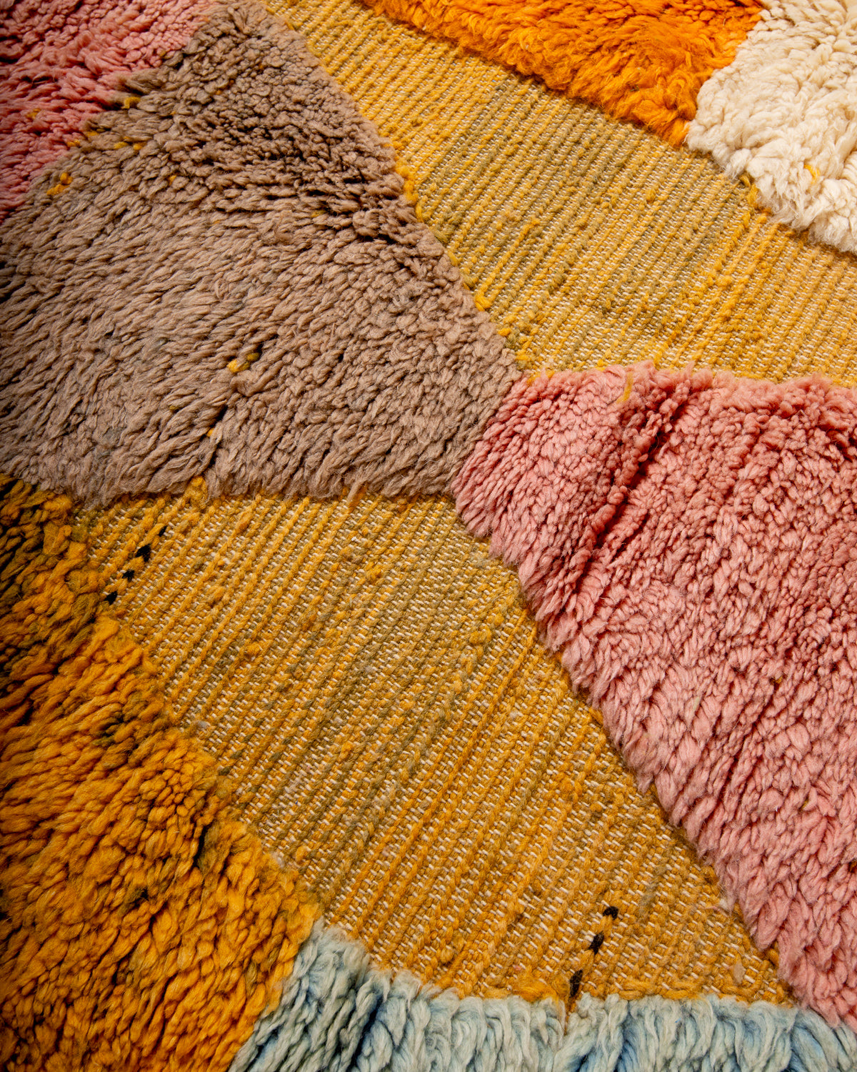 Modern, designer, handcrafted Berber rug from Morocco. Beniourain carpet with beautiful colours and patterns and fluffy wool texture.